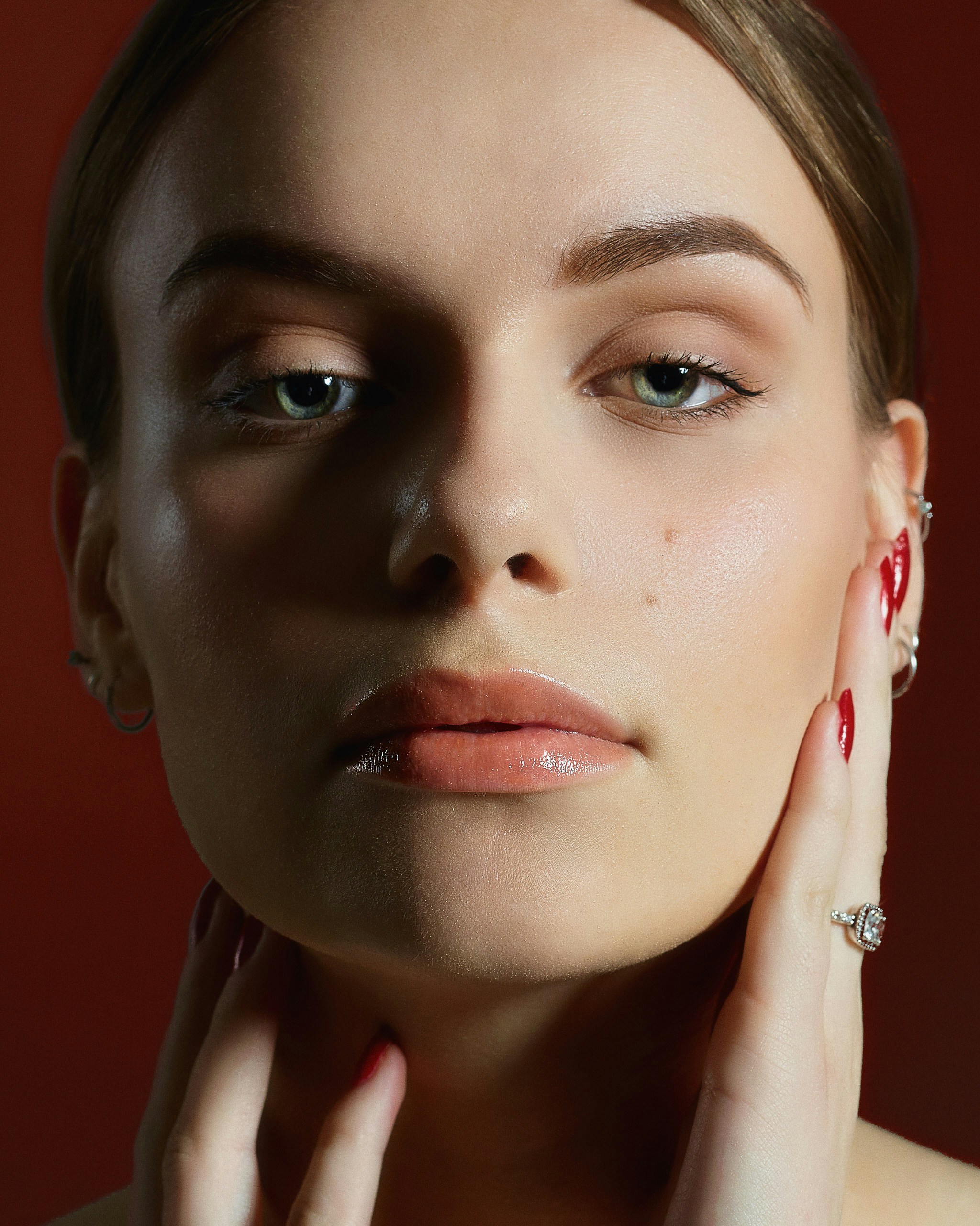 Woman touching her face